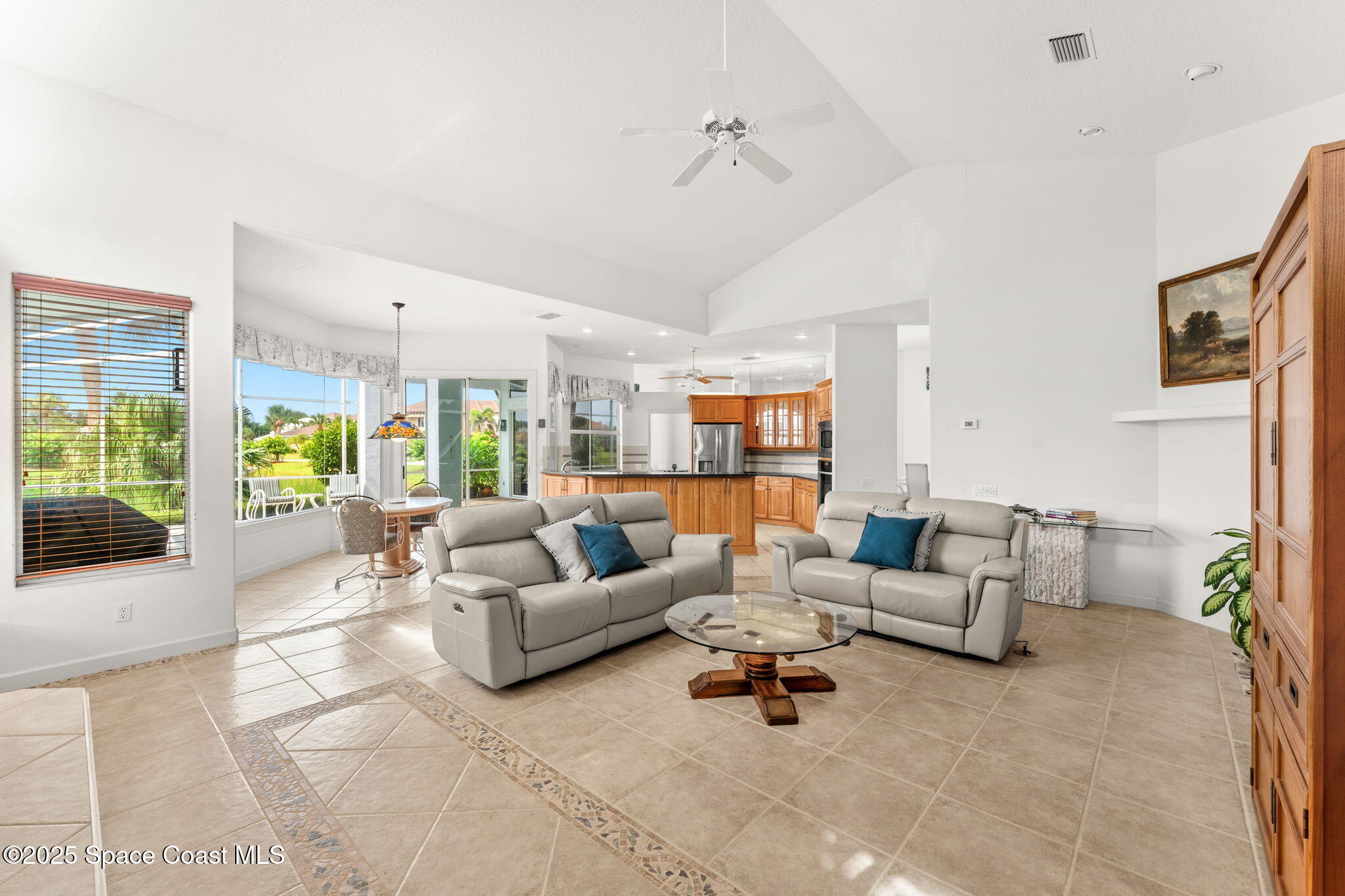 248 Loggerhead Drive Melbourne Beach, FL 32951 - Photo 12 of 35 a living room with furniture and a large window