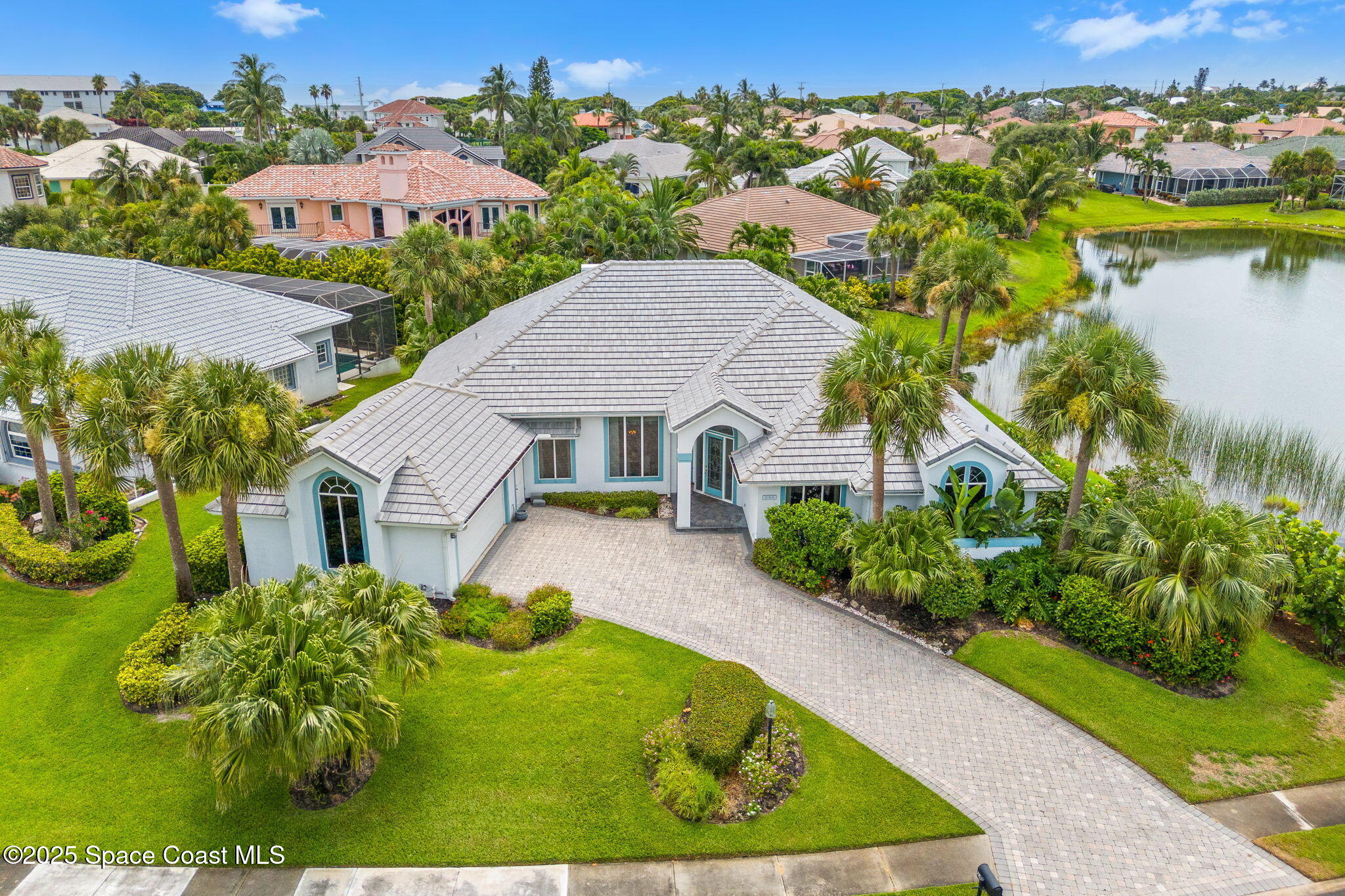 248 Loggerhead Drive Melbourne Beach, FL 32951 - Photo 30 of 35 an aerial view of house with yard swimming pool and outdoor seating