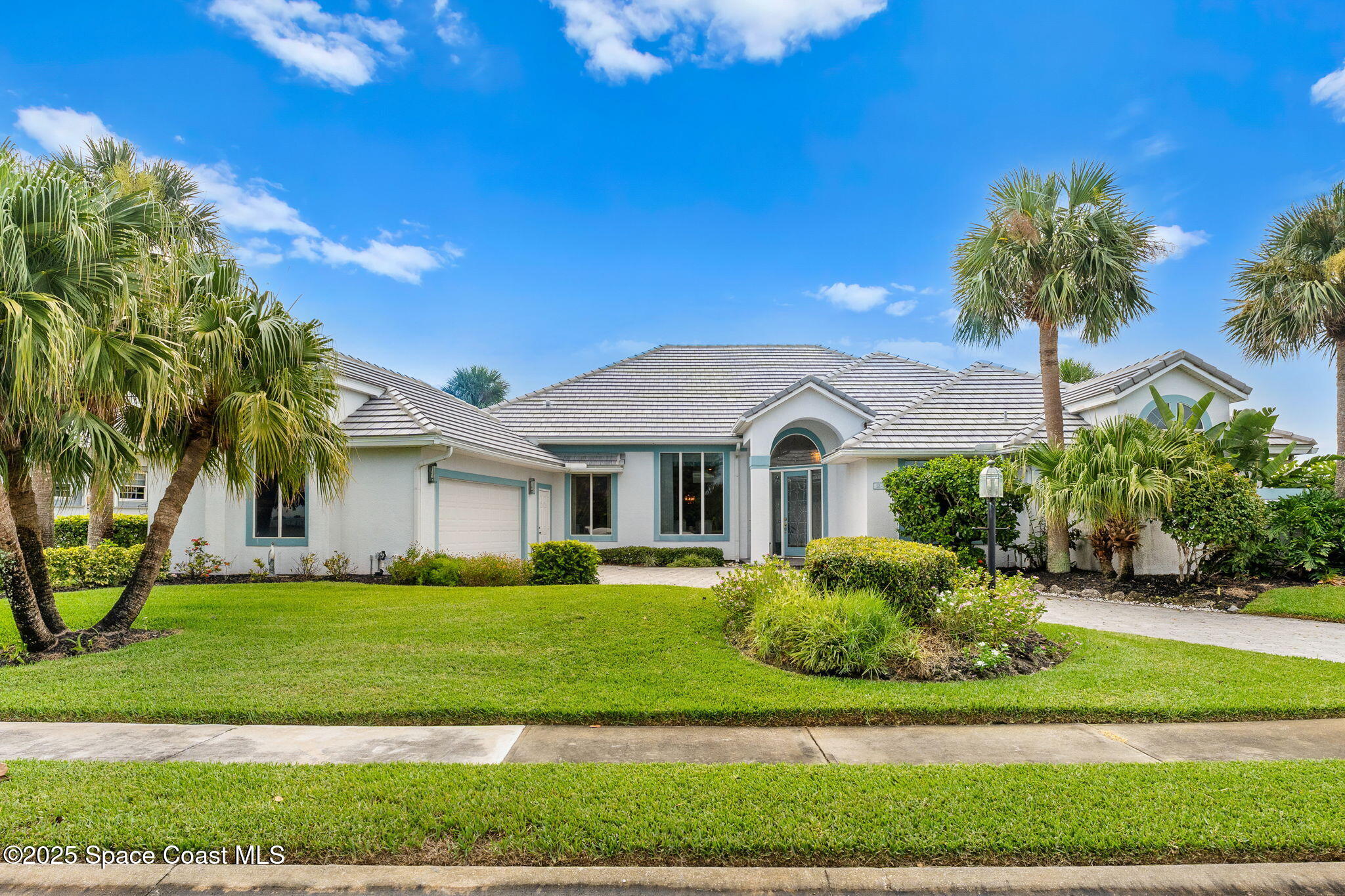 248 Loggerhead Drive Melbourne Beach, FL 32951 - Photo 34 of 35 a front view of a house with a yard
