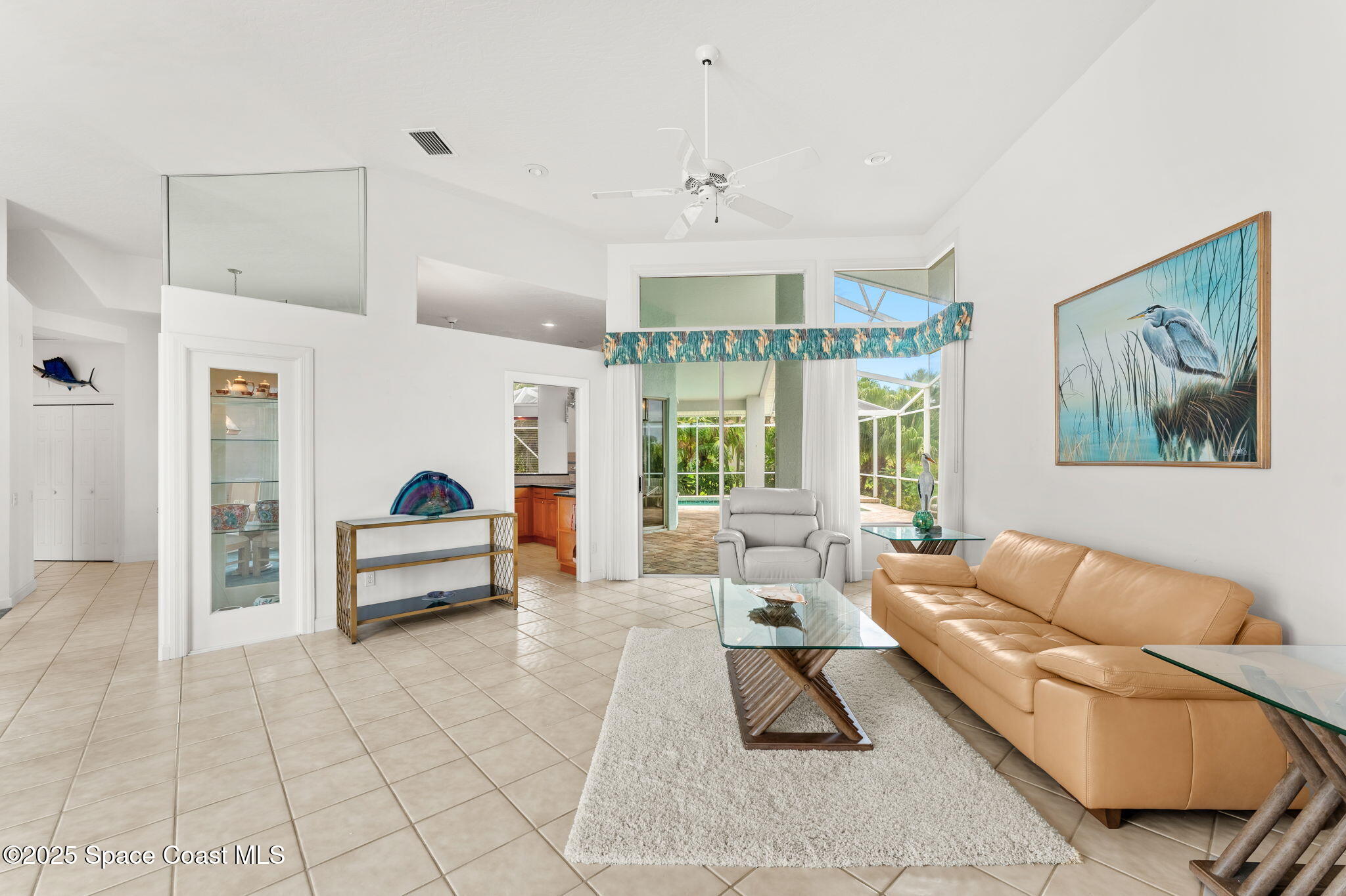 248 Loggerhead Drive Melbourne Beach, FL 32951 - Photo 7 of 35 a living room with furniture and a large window