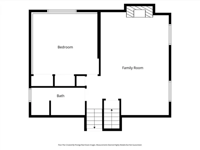 a black and white photo of a living room