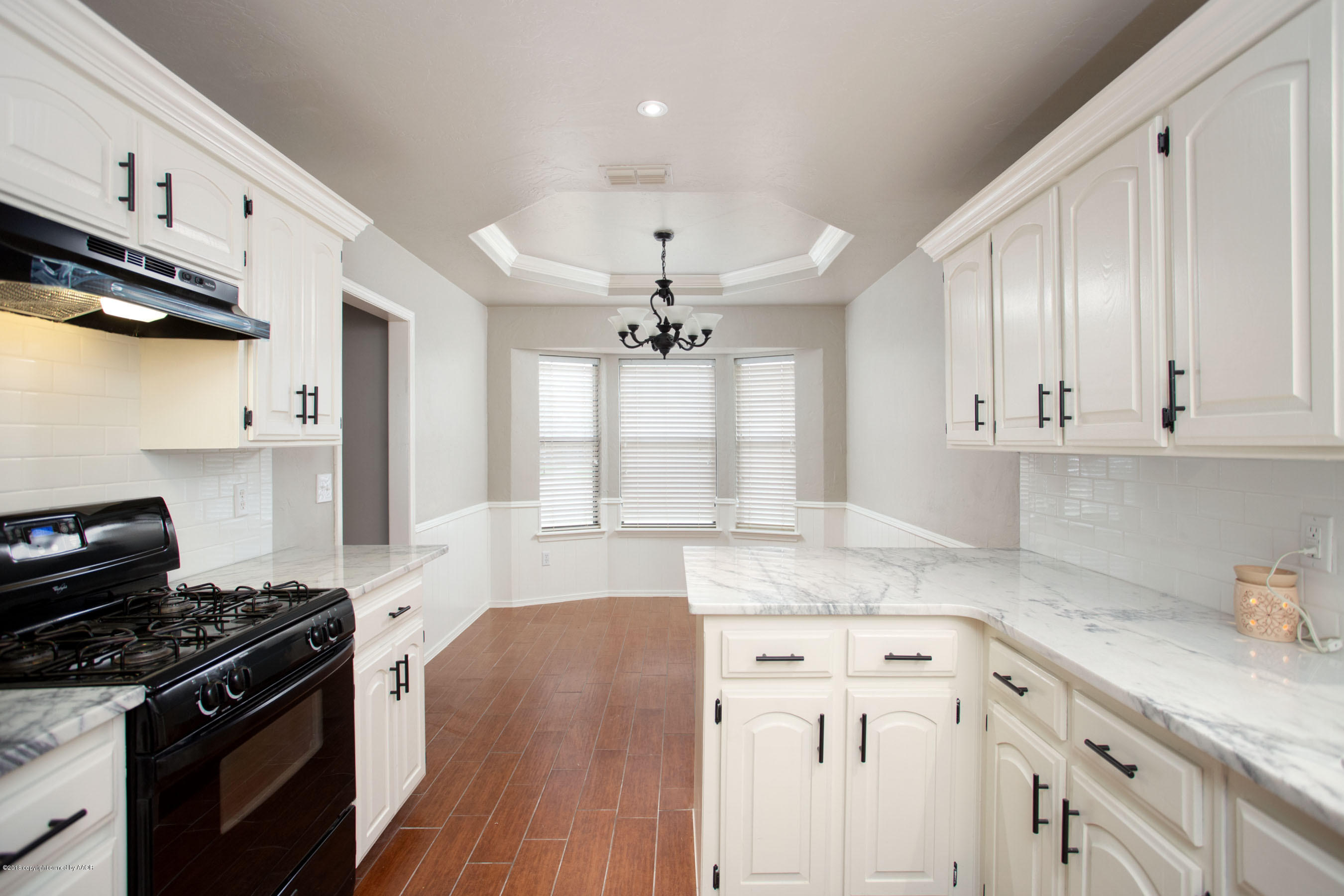 8209 Wrangler Trail Amarillo, TX 79110 - Photo 2 of 22 a kitchen with stainless steel appliances granite countertop a sink stove and refrigerator