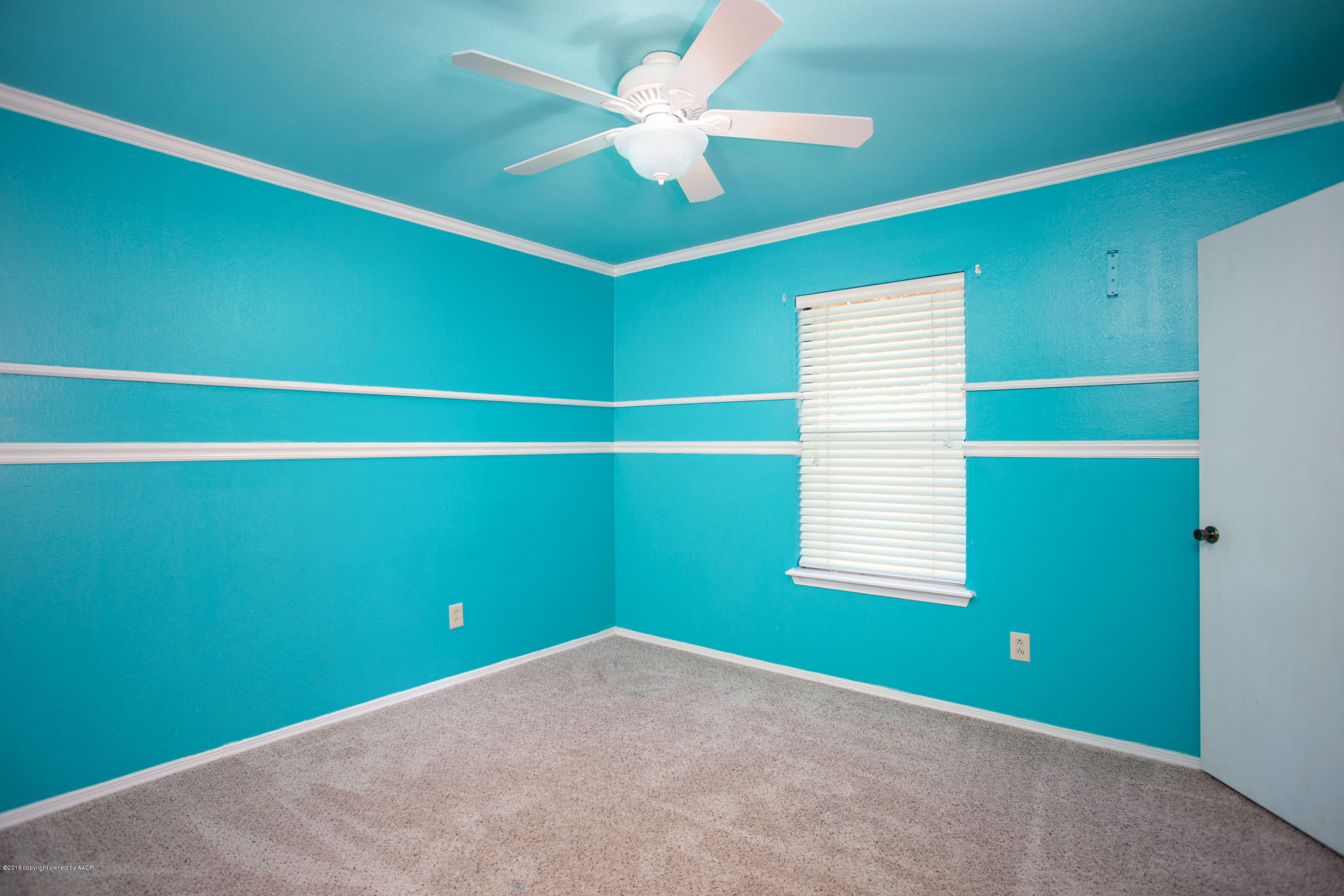 8209 Wrangler Trail Amarillo, TX 79110 - Photo 11 of 22 a view of a room with window and fan