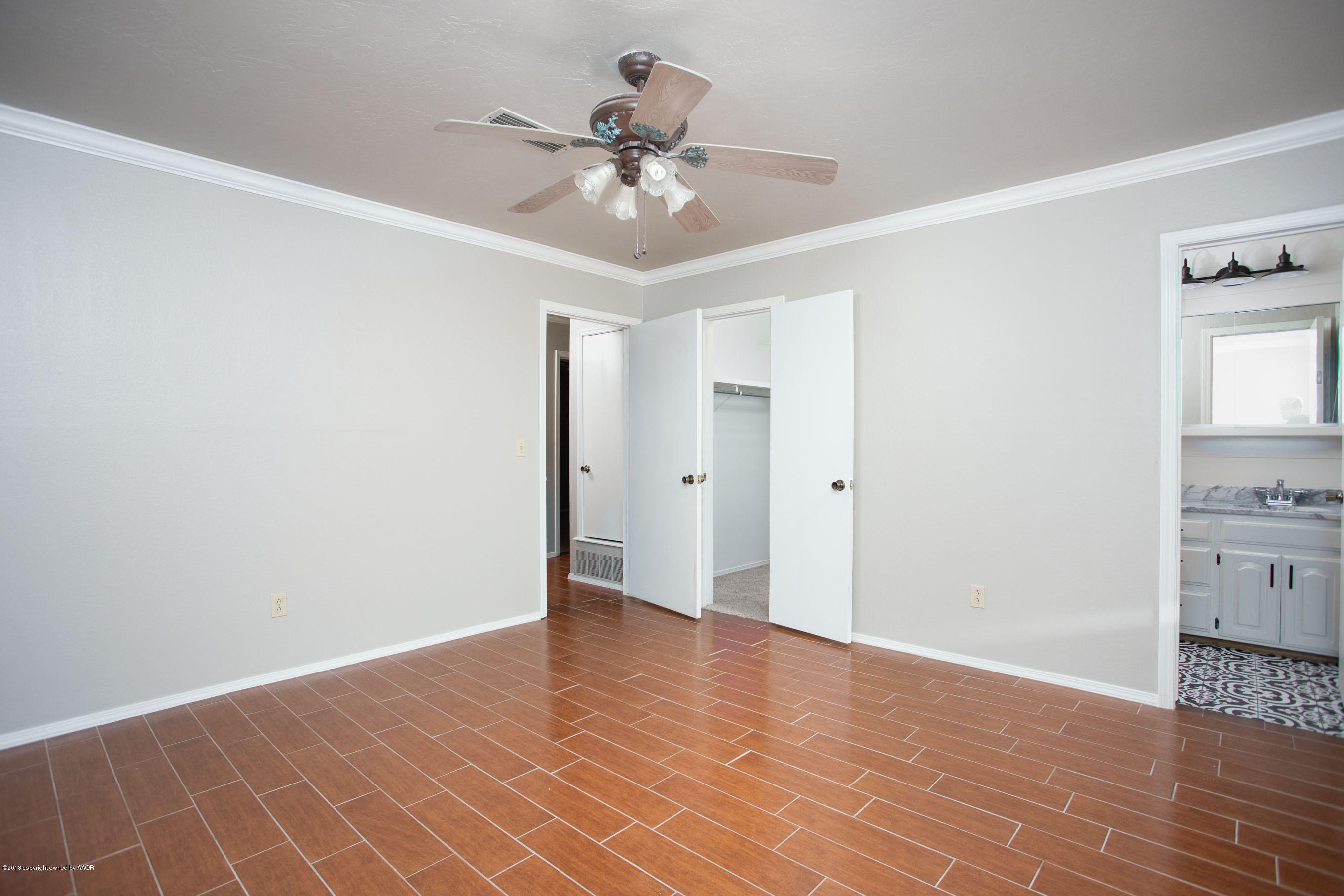 8209 Wrangler Trail Amarillo, TX 79110 - Photo 14 of 22 a view of an empty room with a window