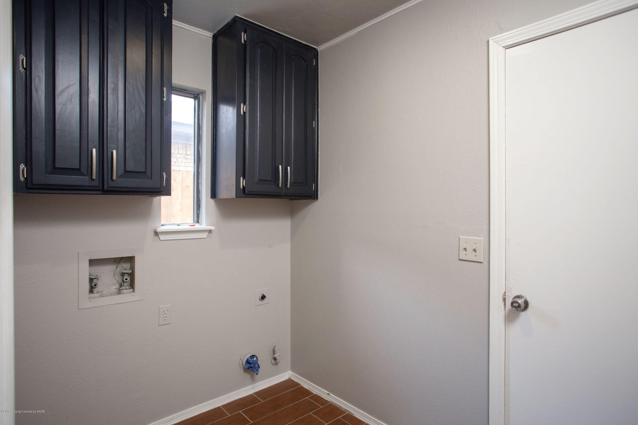 8209 Wrangler Trail Amarillo, TX 79110 - Photo 16 of 22 a view of an entryway with window