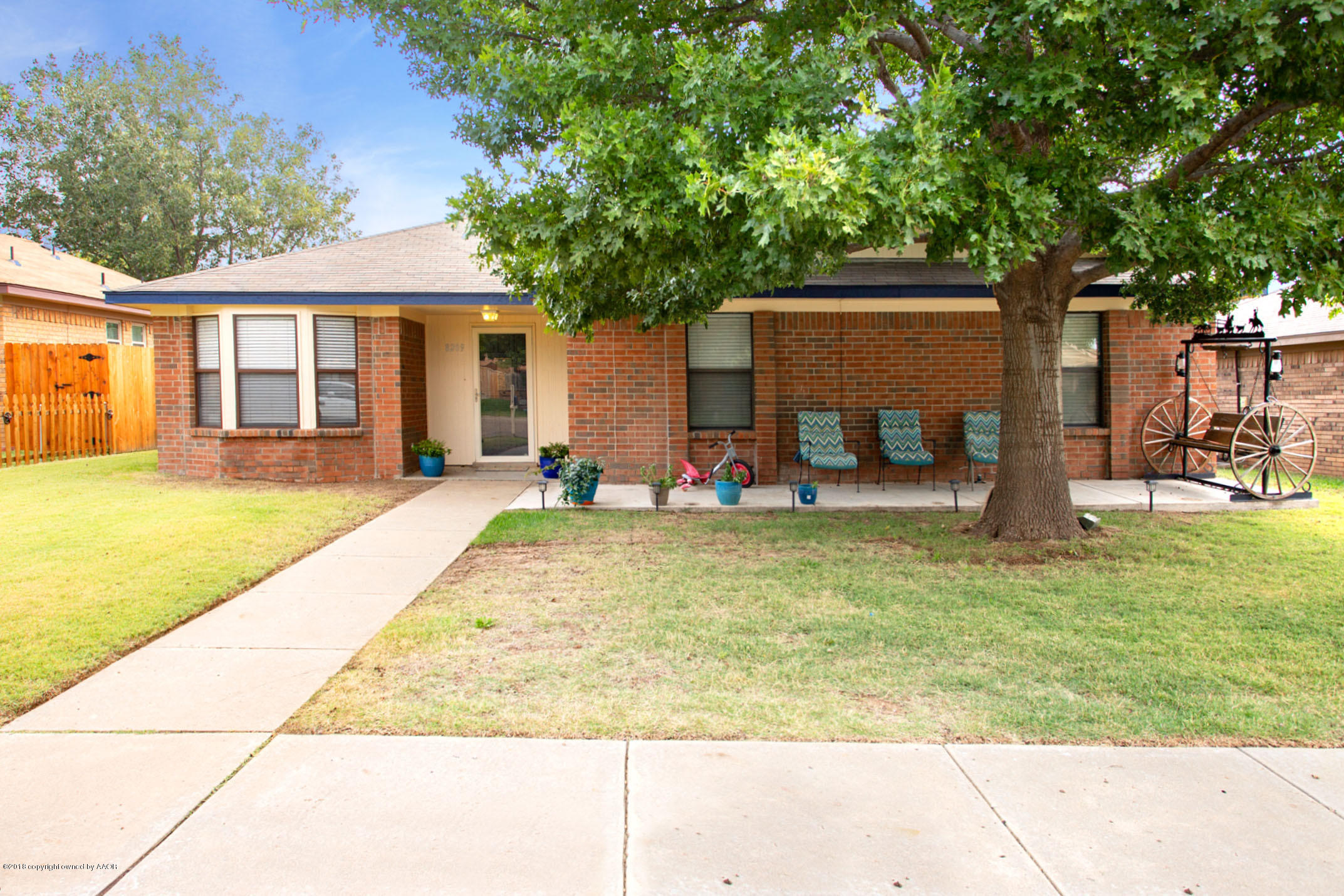 8209 Wrangler Trail Amarillo, TX 79110 - Photo 21 of 22 a view of a house with a backyard