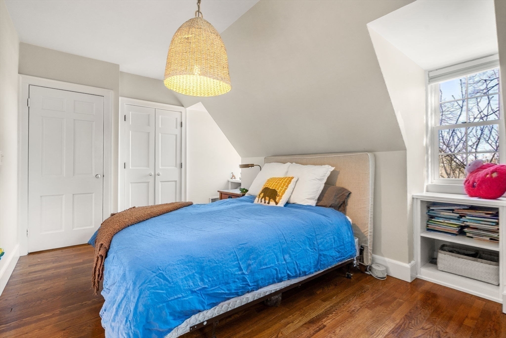170 Benvenue Street Wellesley, MA 02482 - Photo 14 of 22 a bedroom with a bed and a window