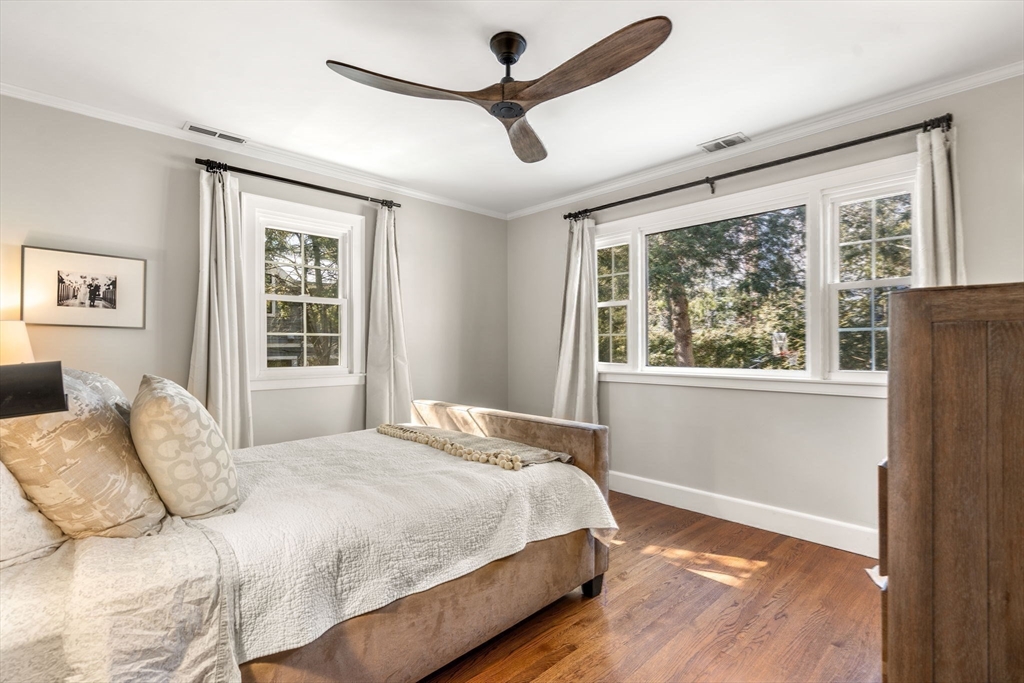 170 Benvenue Street Wellesley, MA 02482 - Photo 15 of 22 a bedroom with a large bed and a window