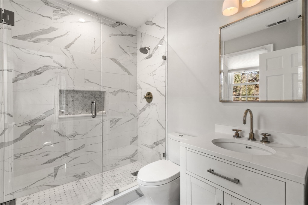 170 Benvenue Street Wellesley, MA 02482 - Photo 16 of 22 a bathroom with a sink toilet and shower