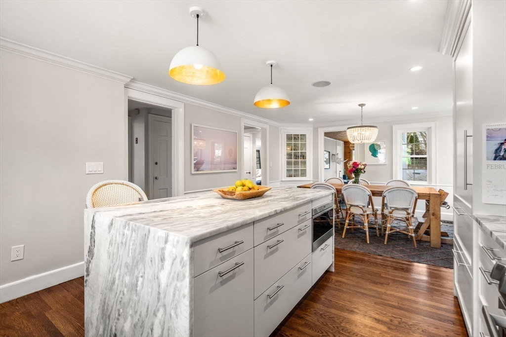 170 Benvenue Street Wellesley, MA 02482 - Photo 4 of 22 a kitchen with stainless steel appliances granite countertop a sink and a wooden floors