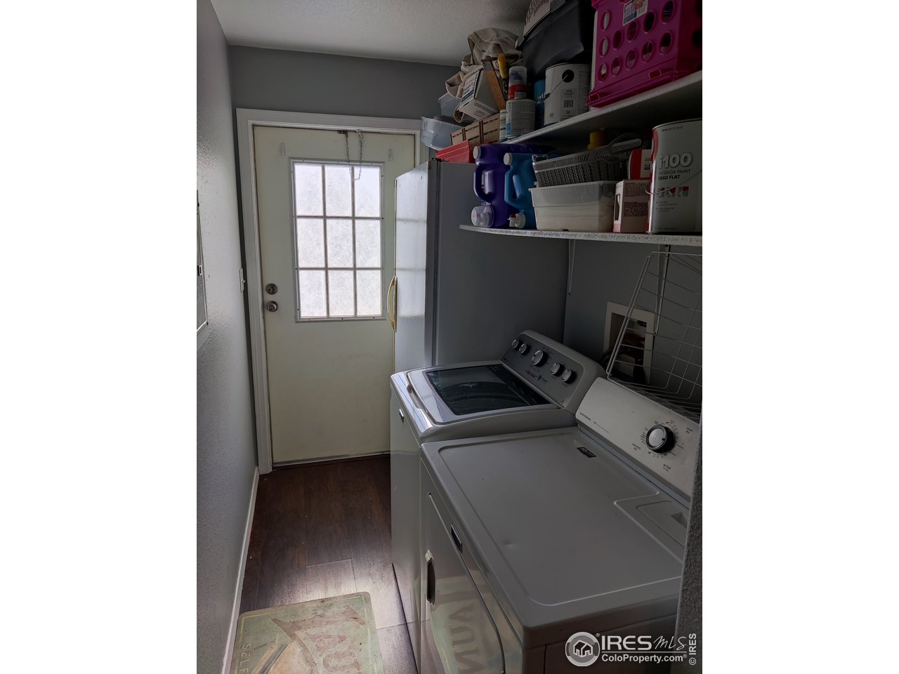 10567 Titan Avenue Firestone, CO 80504 - Photo 7 of 17 a utility room with dryer and washer