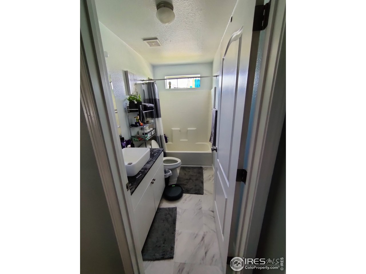 10567 Titan Avenue Firestone, CO 80504 - Photo 9 of 17 a view of a hallway with seating area