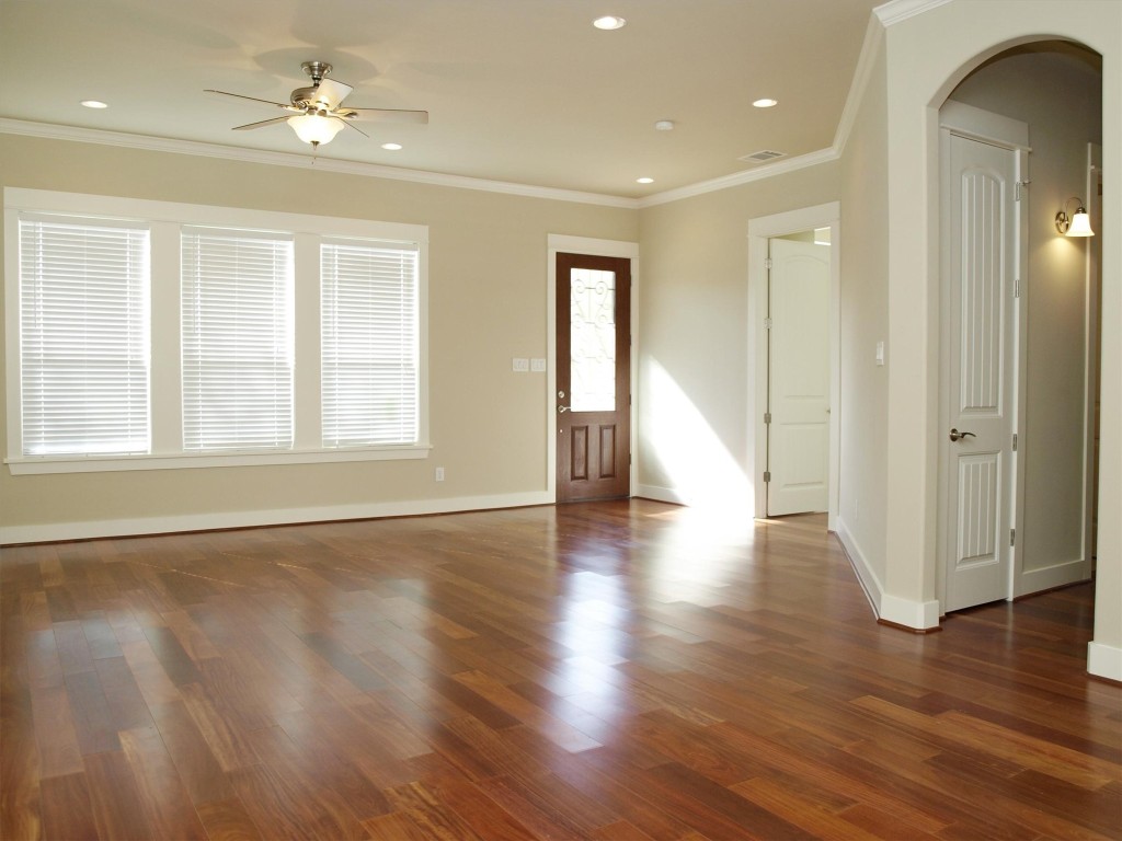 4514 Depew Avenue, Unit A Austin, TX 78751 - Photo 2 of 7 a view of an empty room with wooden floor and a window