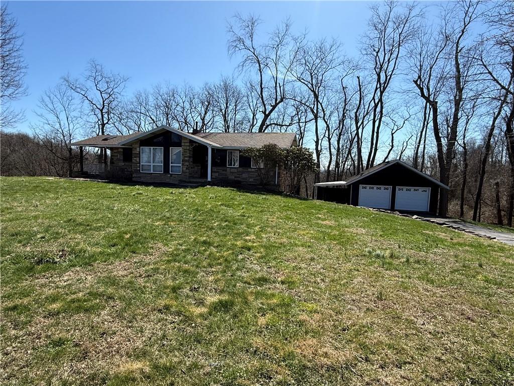 112 Matthew Lane Carmichaels, PA 15320 - Photo 1 of 21 a view of a house with a yard