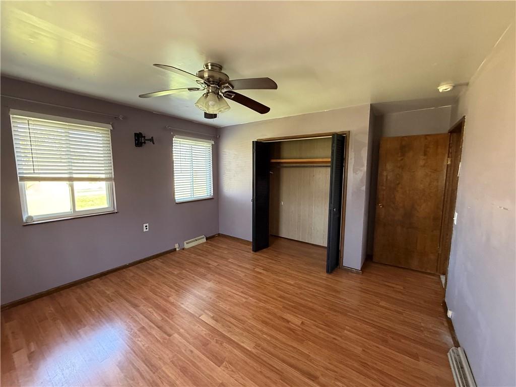 112 Matthew Lane Carmichaels, PA 15320 - Photo 11 of 21 a view of an empty room with a window and wooden floor