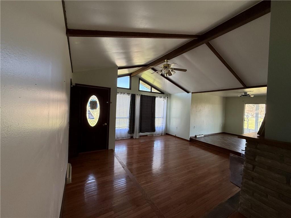 112 Matthew Lane Carmichaels, PA 15320 - Photo 2 of 21 an empty room with wooden floor and windows