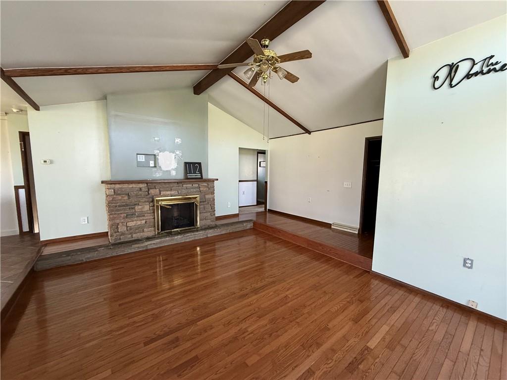 112 Matthew Lane Carmichaels, PA 15320 - Photo 3 of 21 a view of a livingroom with wooden floor and a fireplace