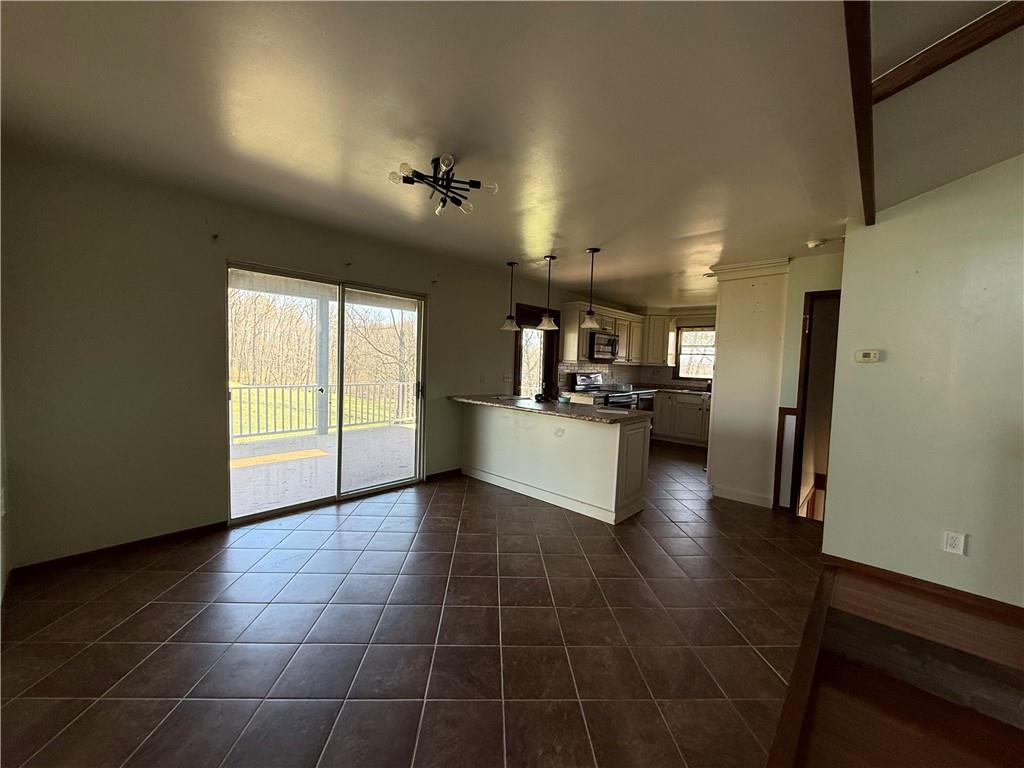 112 Matthew Lane Carmichaels, PA 15320 - Photo 5 of 21 a view of a kitchen with furniture and stainless steel appliances