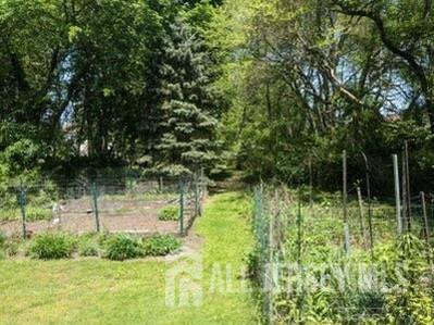181 Disbrow Hill Road Monroe Township, NJ 08831 - Photo 11 of 21 a backyard of a house with lots of green space