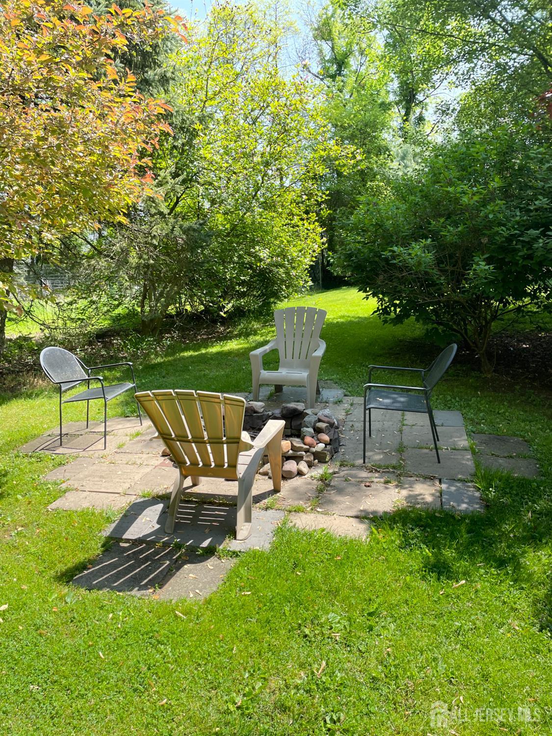 181 Disbrow Hill Road Monroe Township, NJ 08831 - Photo 15 of 21 a view of a chairs and table in the garden