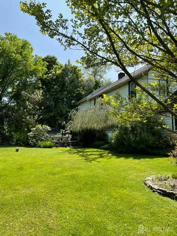 a view of a house with garden