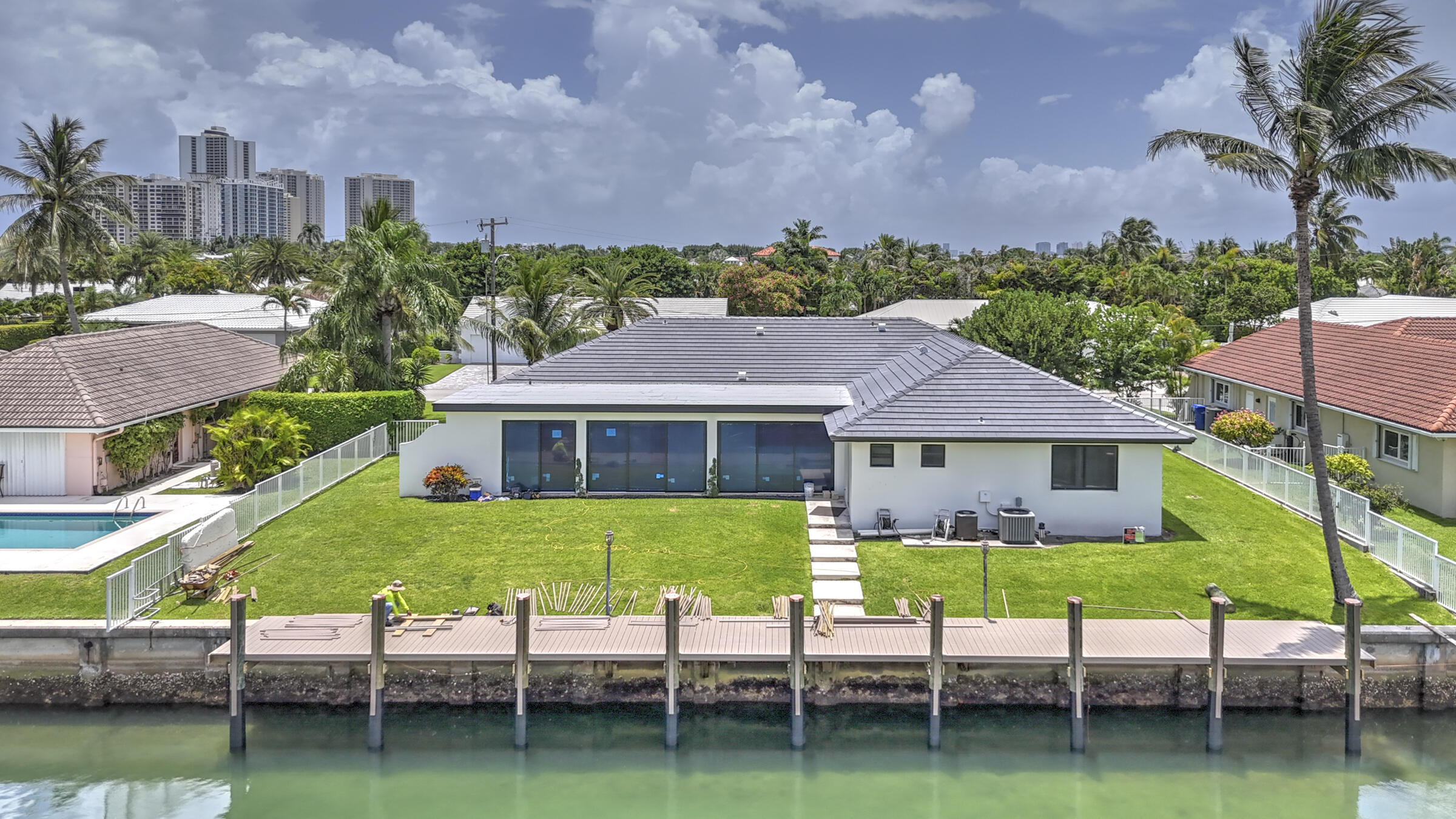 1170 Fairview Lane Singer Island, FL 33404 - Photo 6 of 18 a view of a patio with table and chairs and potted plants