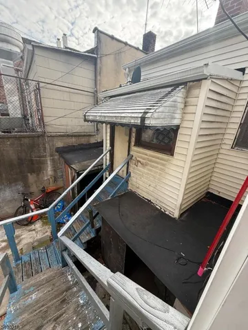 a house with wooden fence
