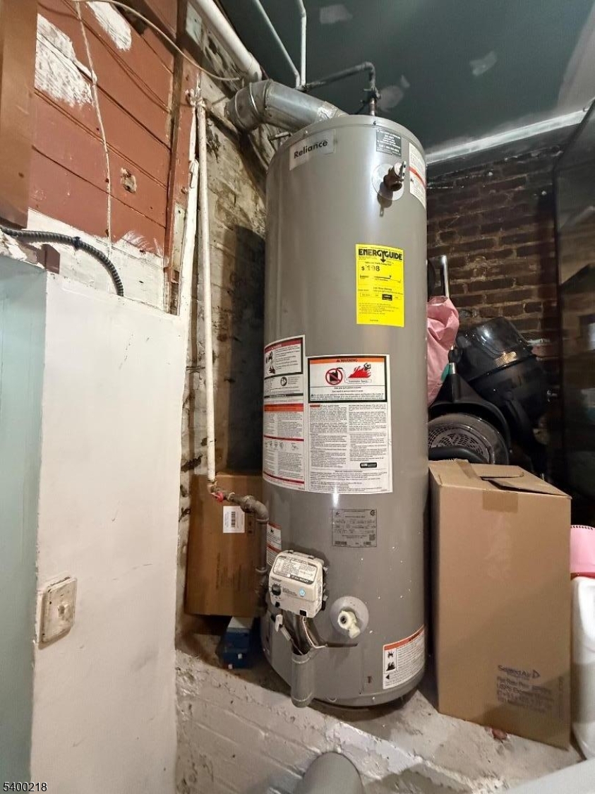 1133 Elizabeth Avenue Elizabeth, NJ 07201 - Photo 10 of 12 a utility room with dryer and washer