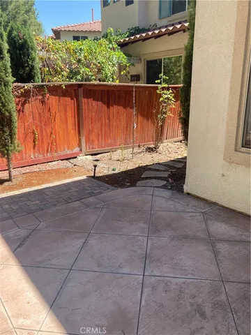 a view of a door with wooden floor