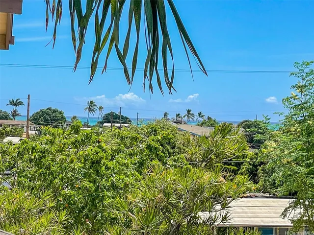 a front view of a house with yard