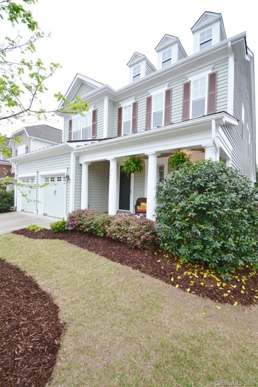 9433 Ridgeforest Drive Charlotte, NC 28277 - Photo 2 of 18 a front view of a house with garden