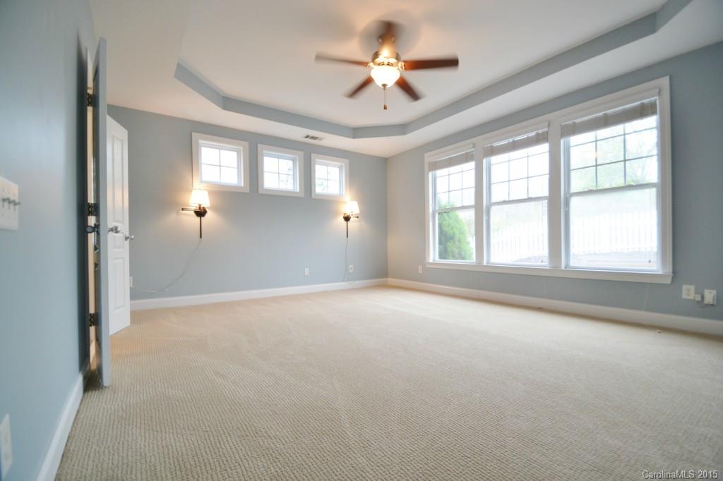 9433 Ridgeforest Drive Charlotte, NC 28277 - Photo 12 of 18 a view of an empty room with a window