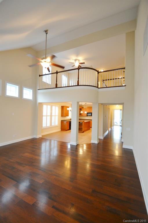 9433 Ridgeforest Drive Charlotte, NC 28277 - Photo 10 of 18 a view of empty room with wooden floor