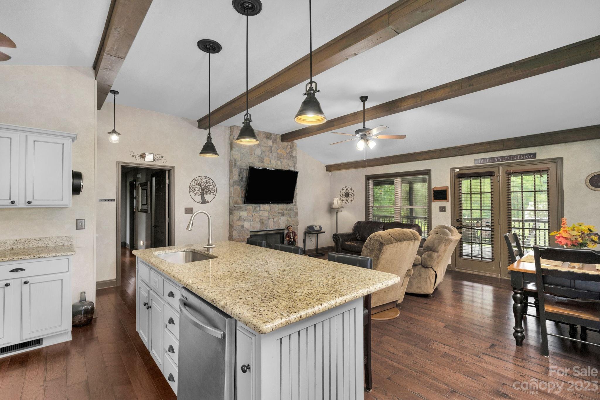 3016 Old Montgomery Place Road Monroe, NC 28112 - Photo 13 of 40 a large kitchen with kitchen island a large island in it