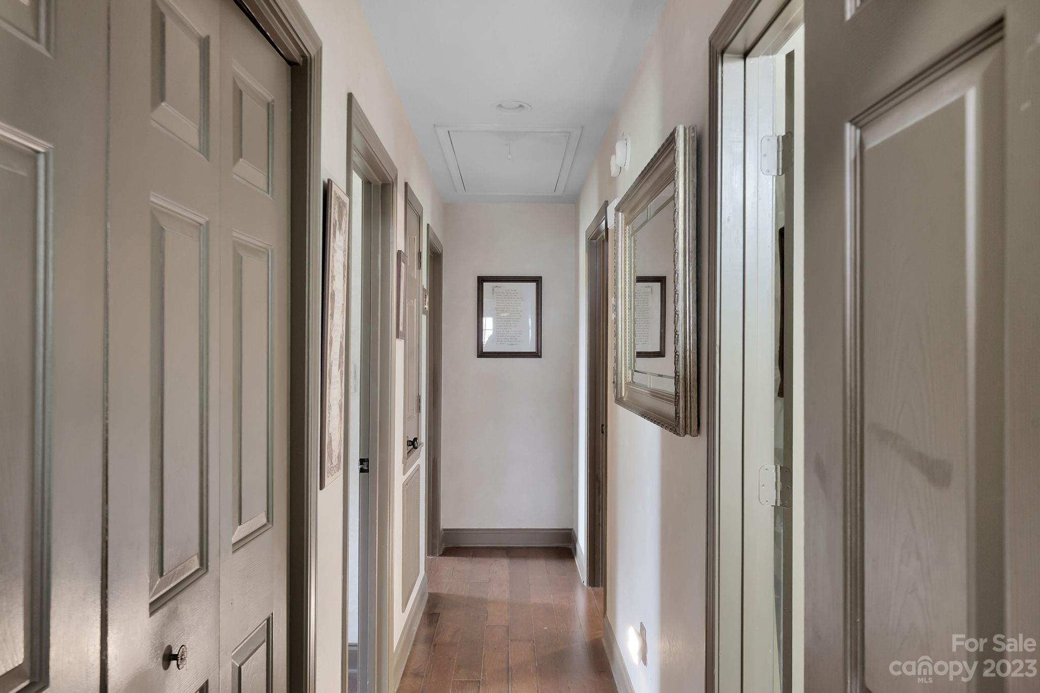 3016 Old Montgomery Place Road Monroe, NC 28112 - Photo 17 of 40 a view of a hallway with wooden floor and closet area