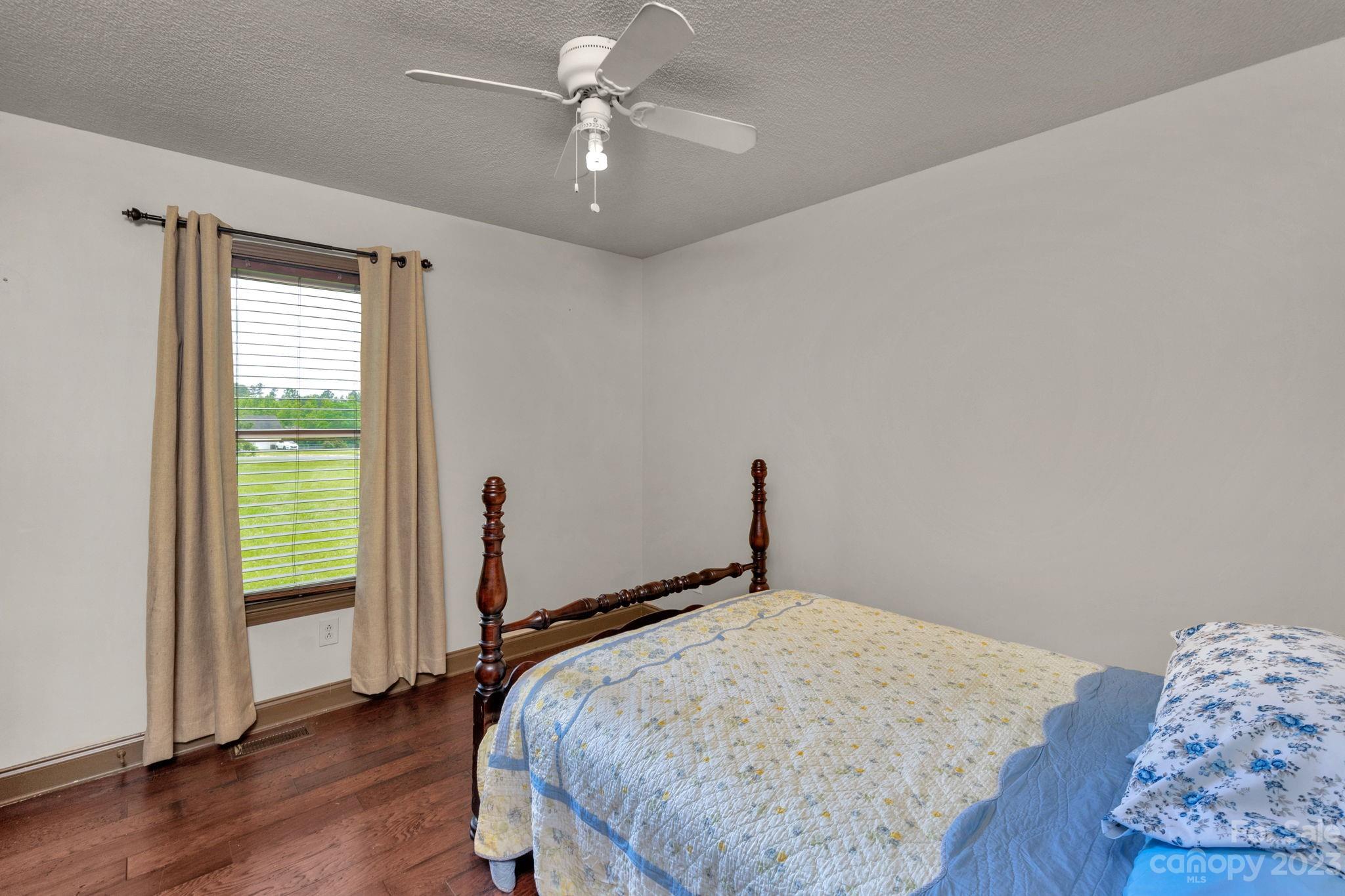 3016 Old Montgomery Place Road Monroe, NC 28112 - Photo 20 of 40 a bedroom with bed and a window
