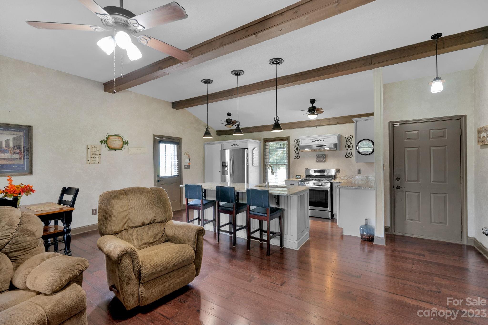 3016 Old Montgomery Place Road Monroe, NC 28112 - Photo 26 of 40 a living room with furniture and wooden floor