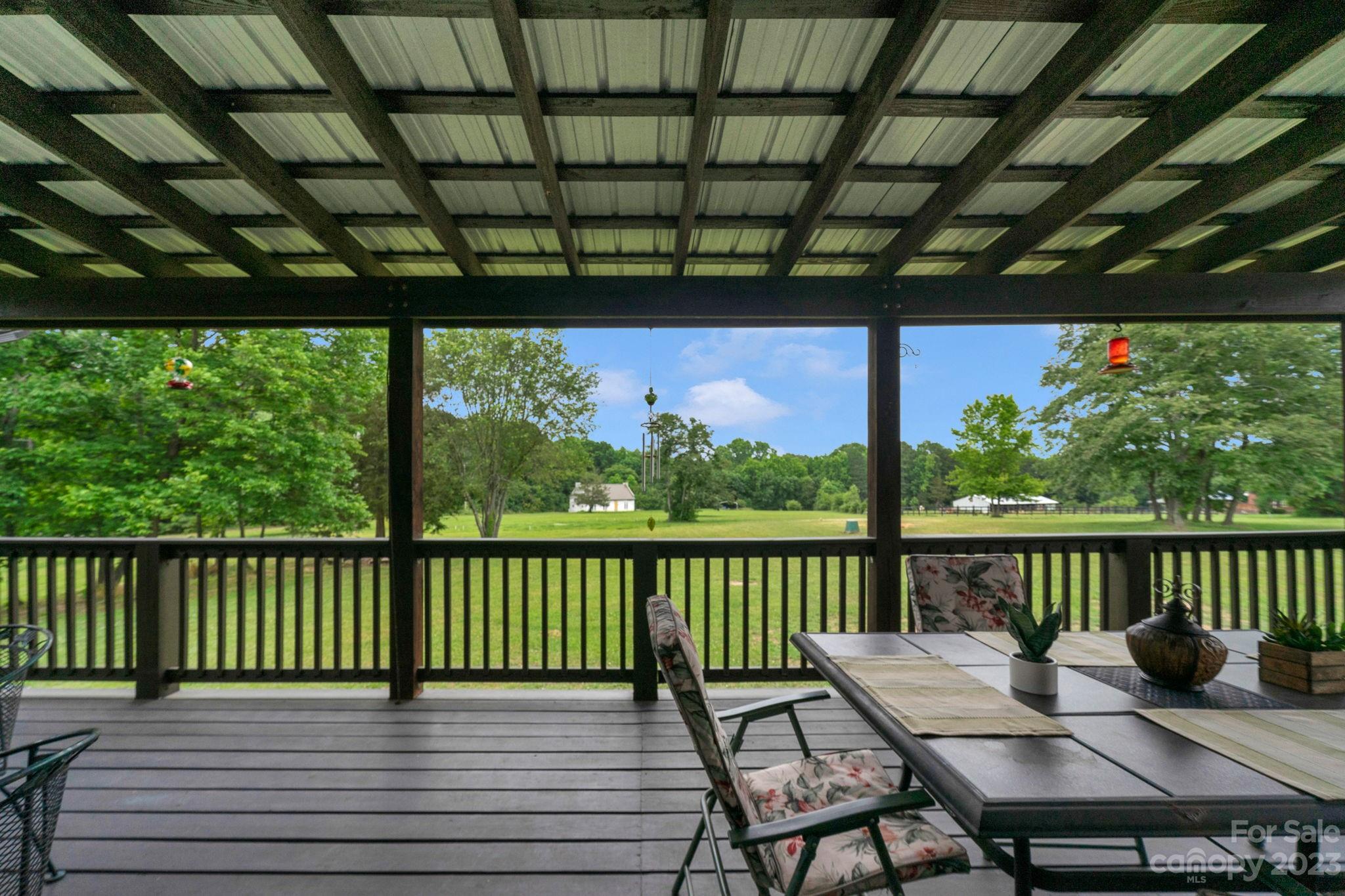 3016 Old Montgomery Place Road Monroe, NC 28112 - Photo 29 of 40 a view of a patio with wooden floor