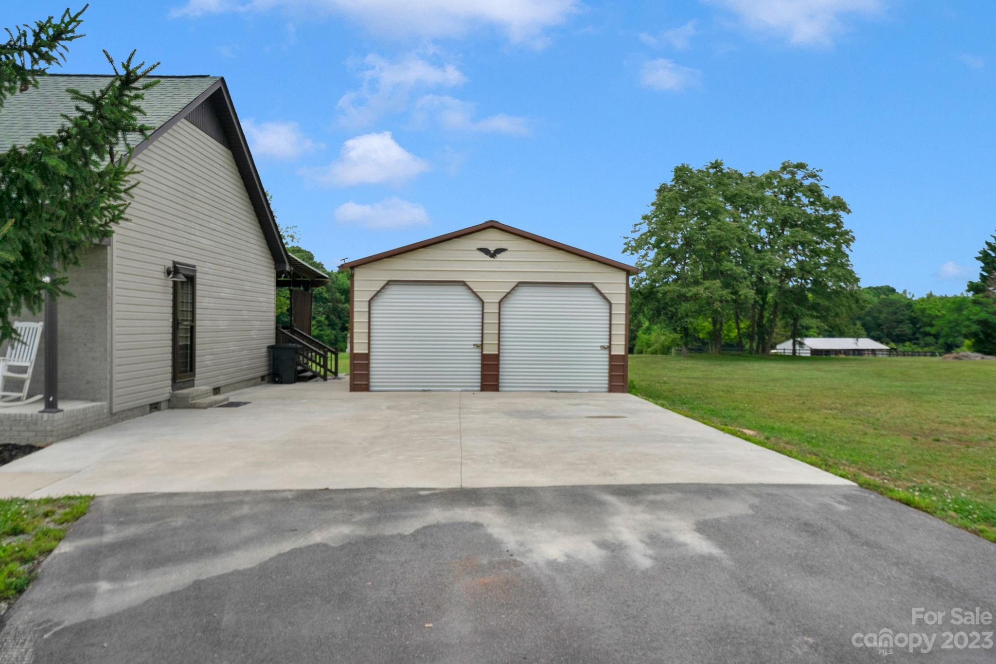 3016 Old Montgomery Place Road Monroe, NC 28112 - Photo 3 of 40 a front view of a house with yard
