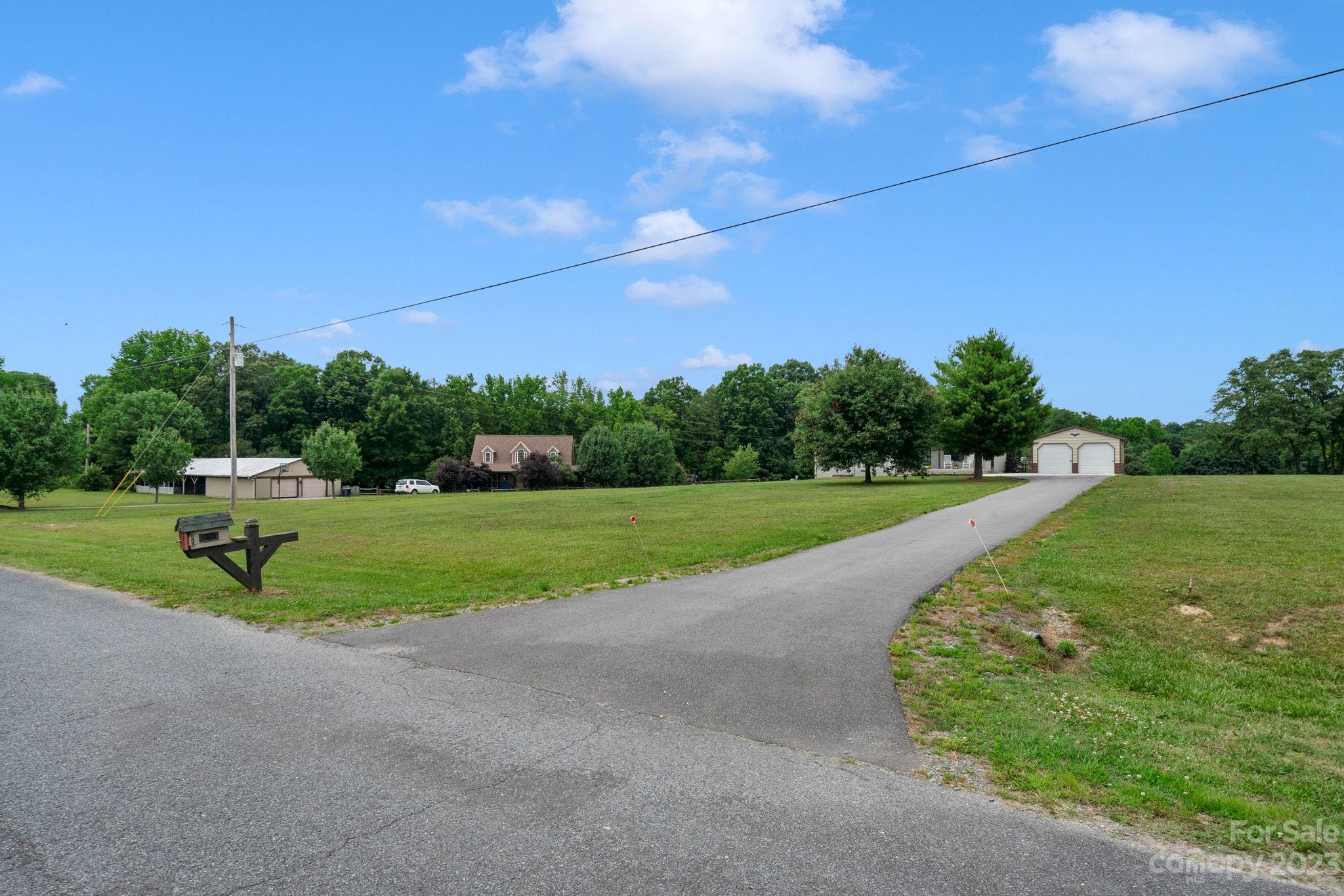 3016 Old Montgomery Place Road Monroe, NC 28112 - Photo 38 of 40 a view of a garden with an outdoor space