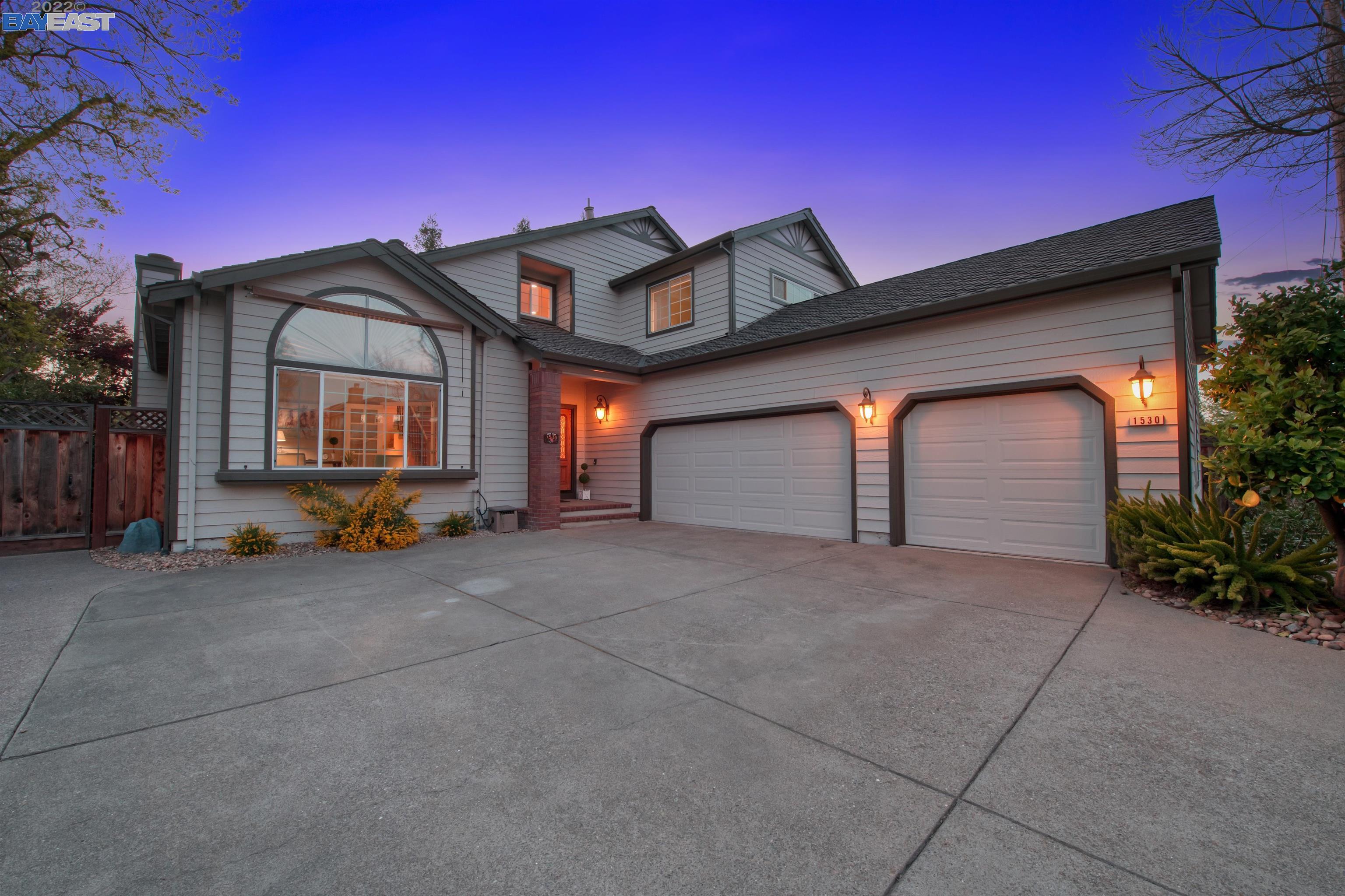 a house view with a garden space