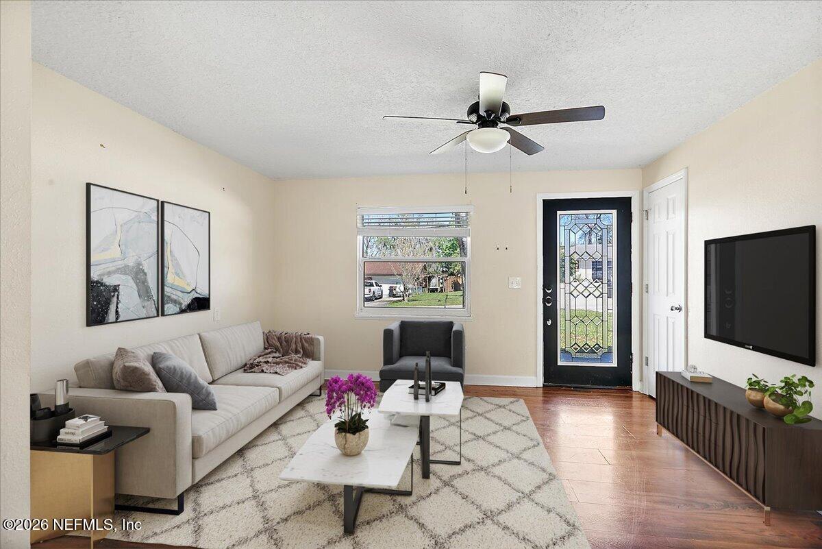 428 Neptune Road Orange Park, FL 32073 - Photo 2 of 13 02-Living Room Staged