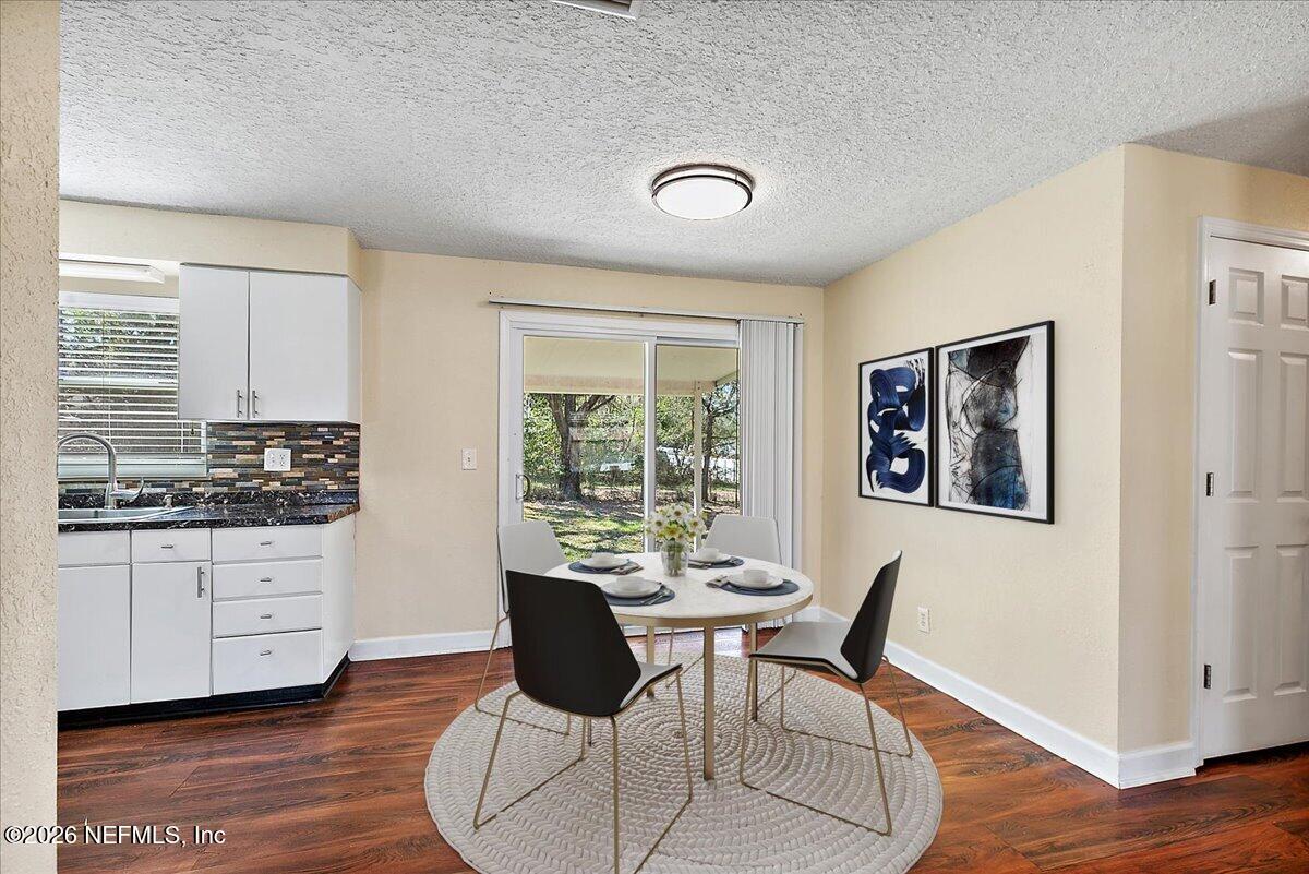 428 Neptune Road Orange Park, FL 32073 - Photo 5 of 13 05-Dining Staged