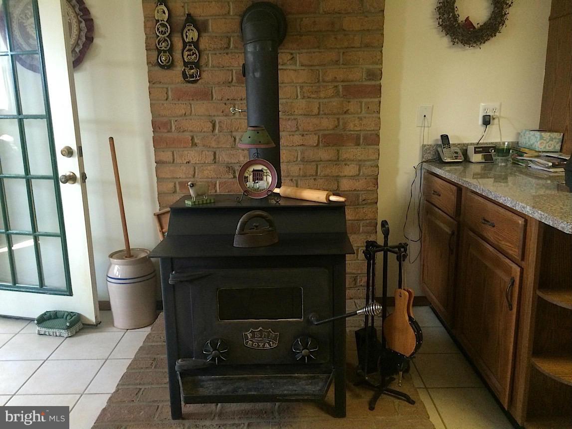 2114 Ebbvale Road Manchester, MD 21102 - Photo 13 of 30 Wood stove adds ambiance and can heat house!