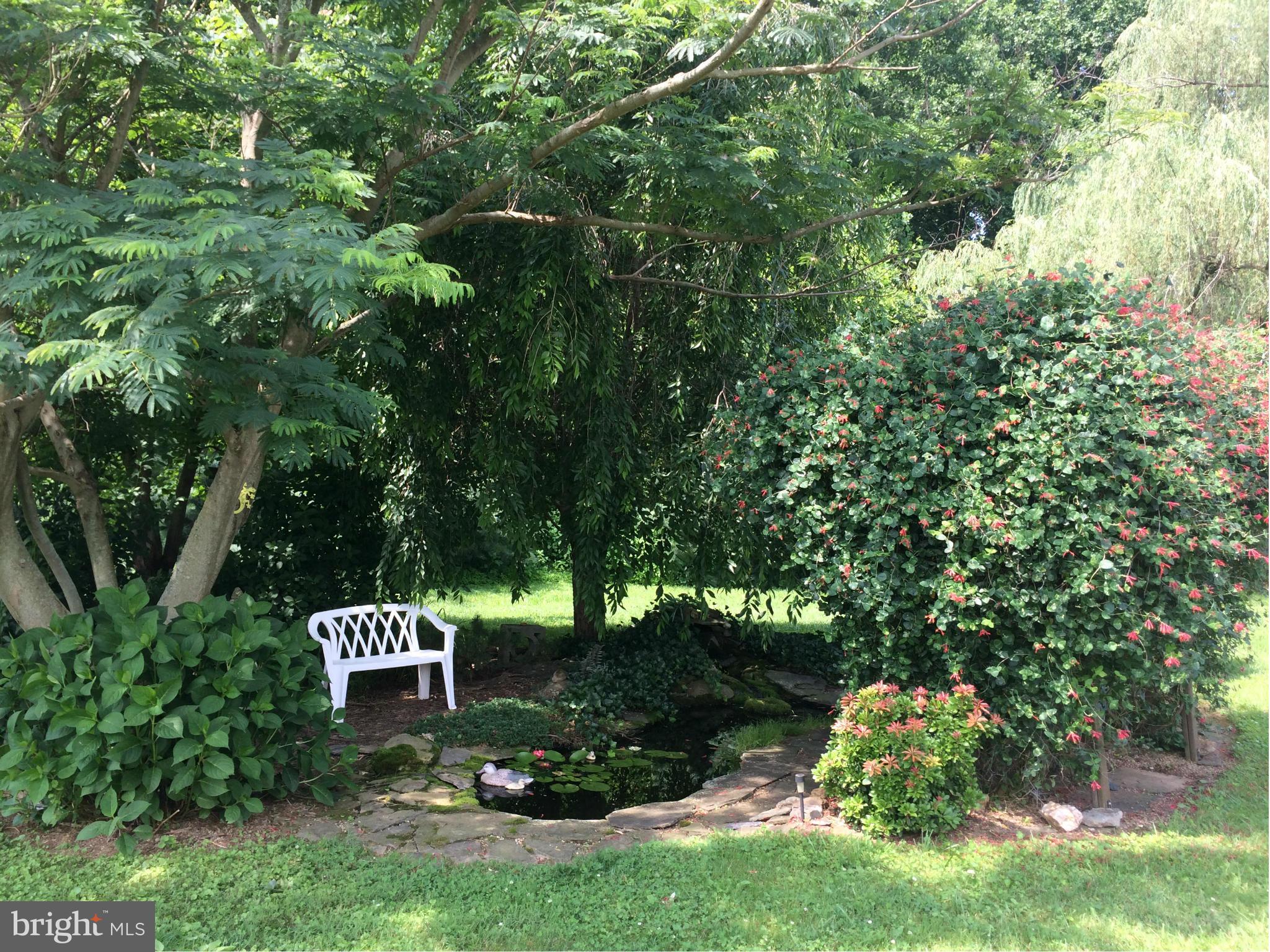 2114 Ebbvale Road Manchester, MD 21102 - Photo 9 of 30 Relax by the fish pond so beautifully landscaped!
