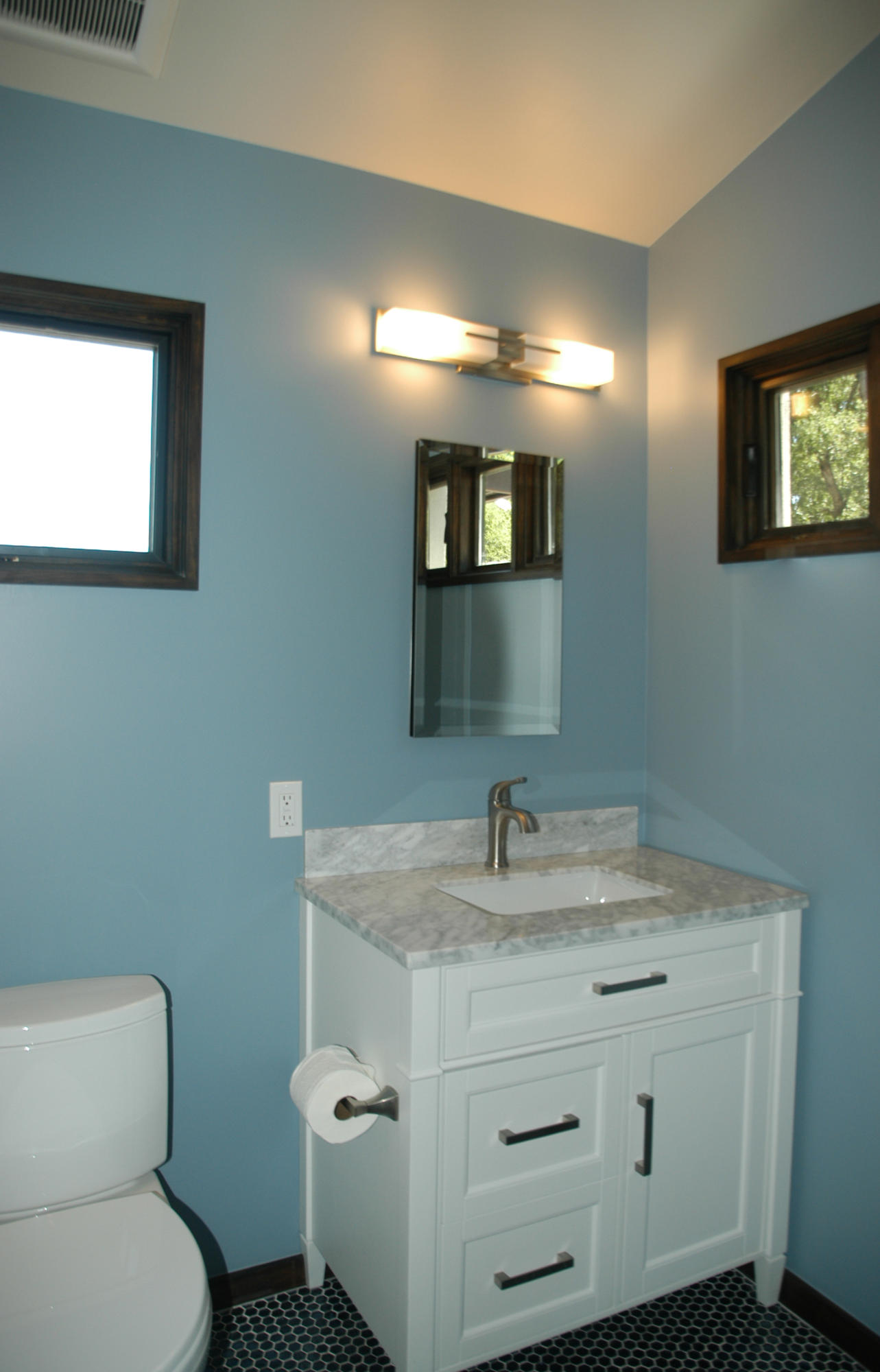 1454 Tunnel Road, Unit GUEST APARTMENT Santa Barbara, CA 93105 - Photo 8 of 10 a bathroom with a toilet sink and mirror