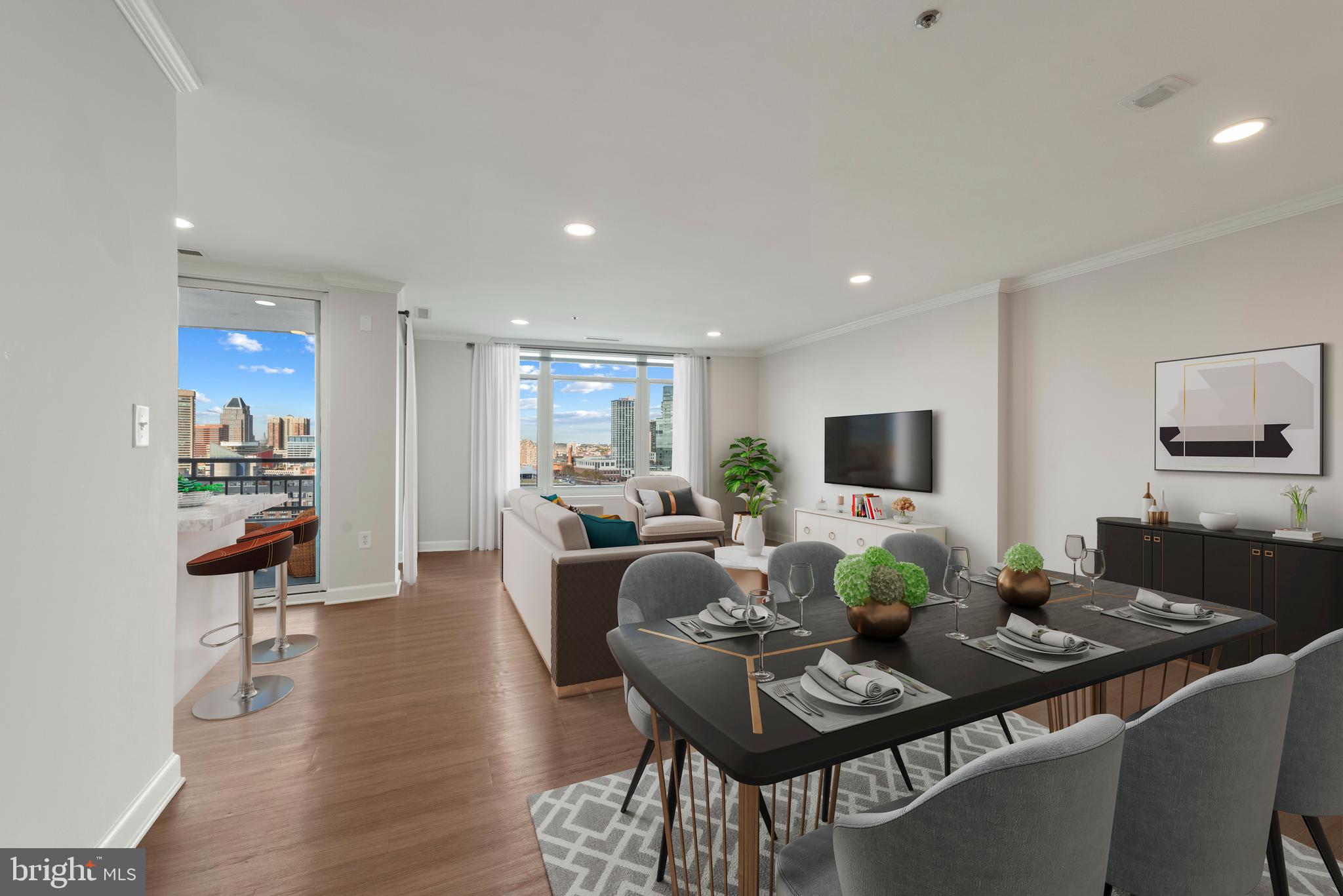 100 Harborview Drive, Unit 1209 Baltimore, MD 21230 - Photo 3 of 43 a living room with furniture a flat screen tv and a dining table