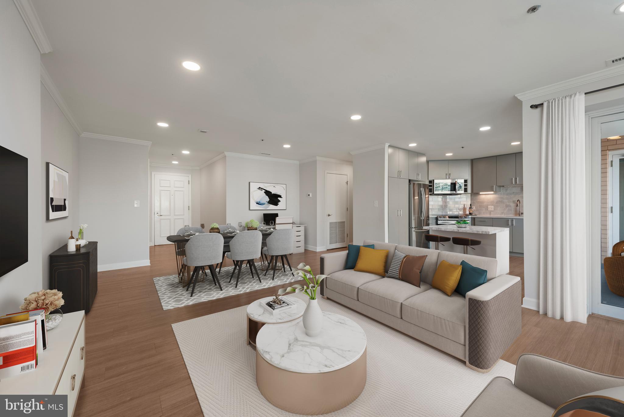 100 Harborview Drive, Unit 1209 Baltimore, MD 21230 - Photo 4 of 43 a living room with furniture kitchen and a table