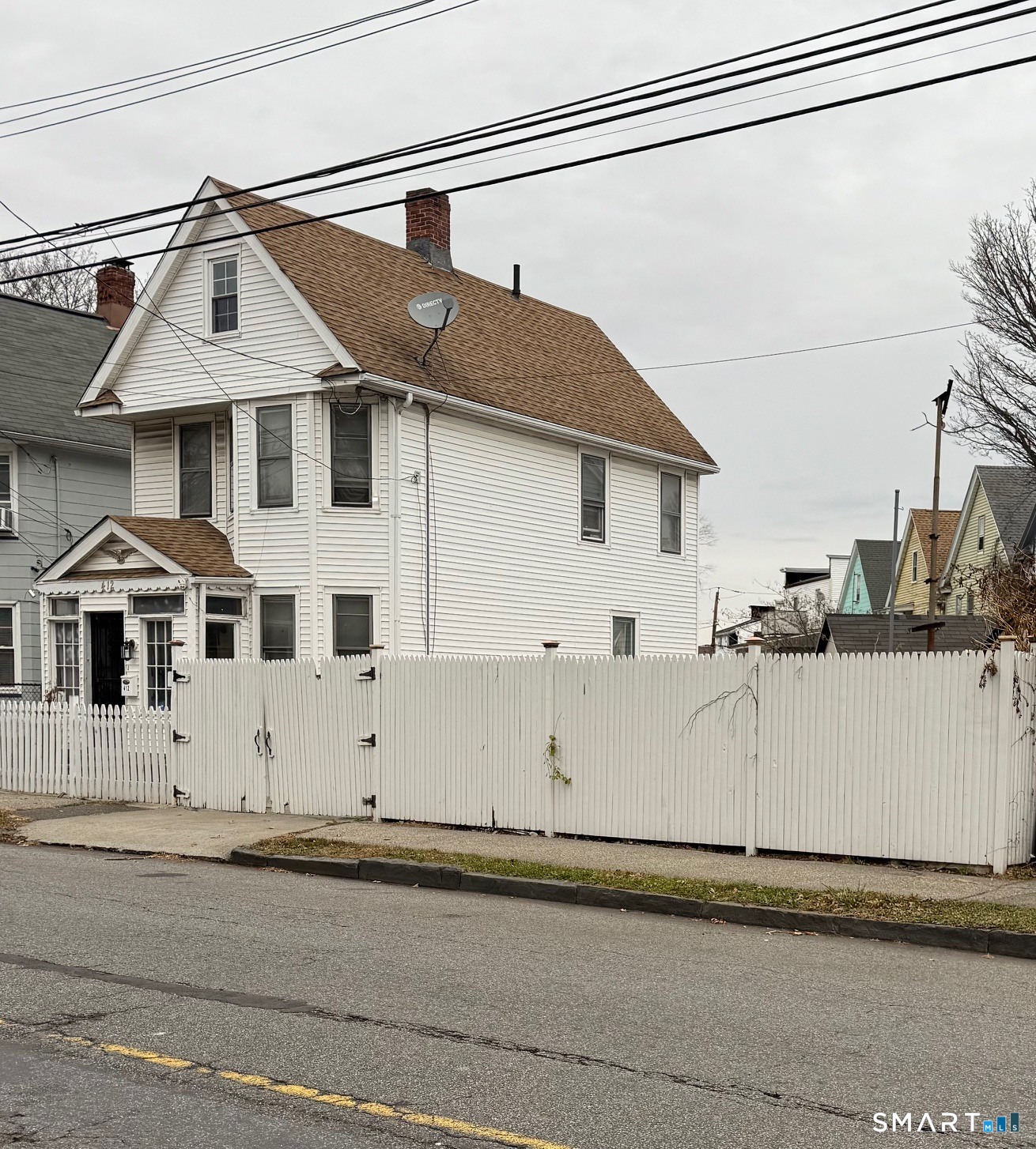 a white building with a outdoor space