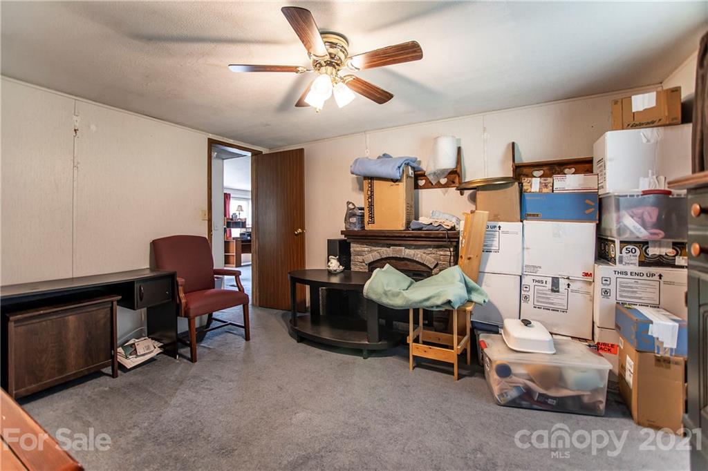 1481 Old Friendship Road Rock Hill, SC 29730 - Photo 16 of 23 a bedroom with furniture and a chandelier fan